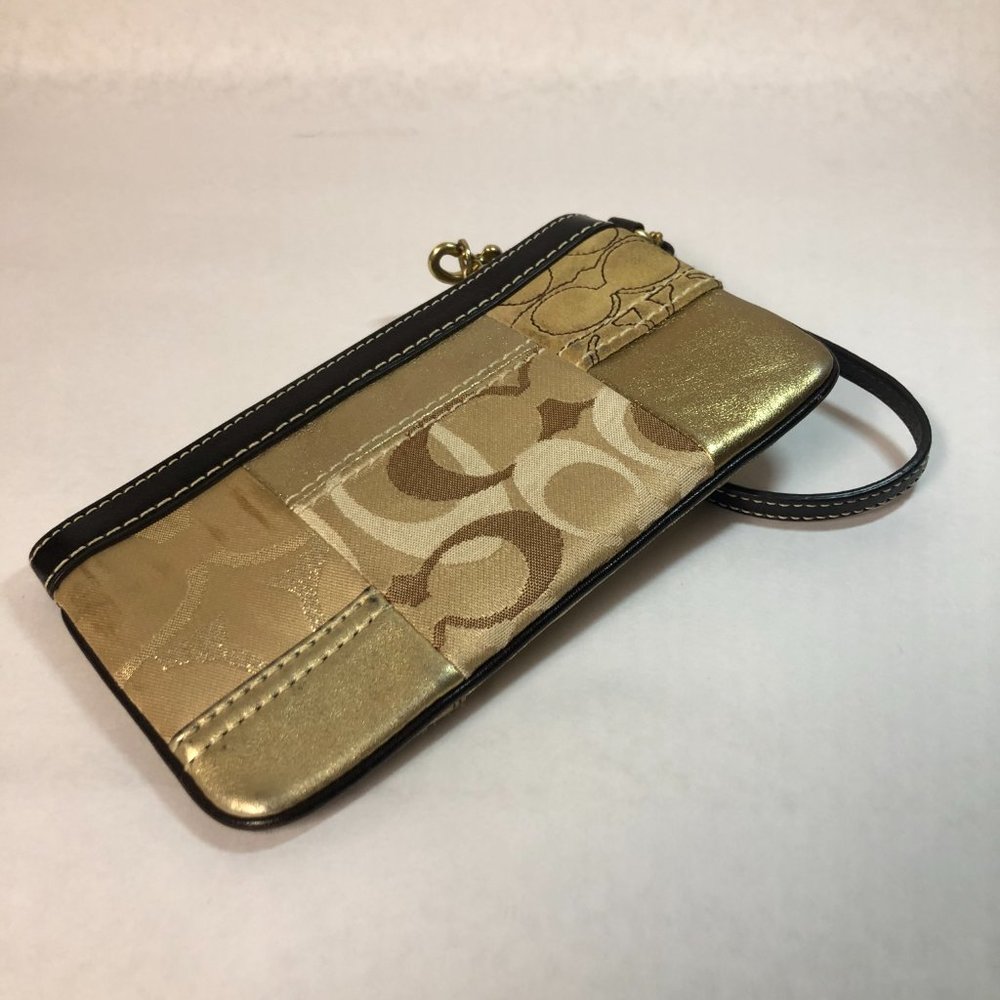 Coach wristlet, patchwork of coach pattern and gold